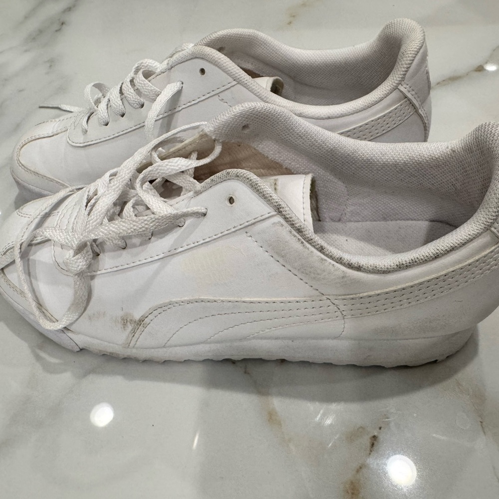 Classic white Puma sneakers, size 5.